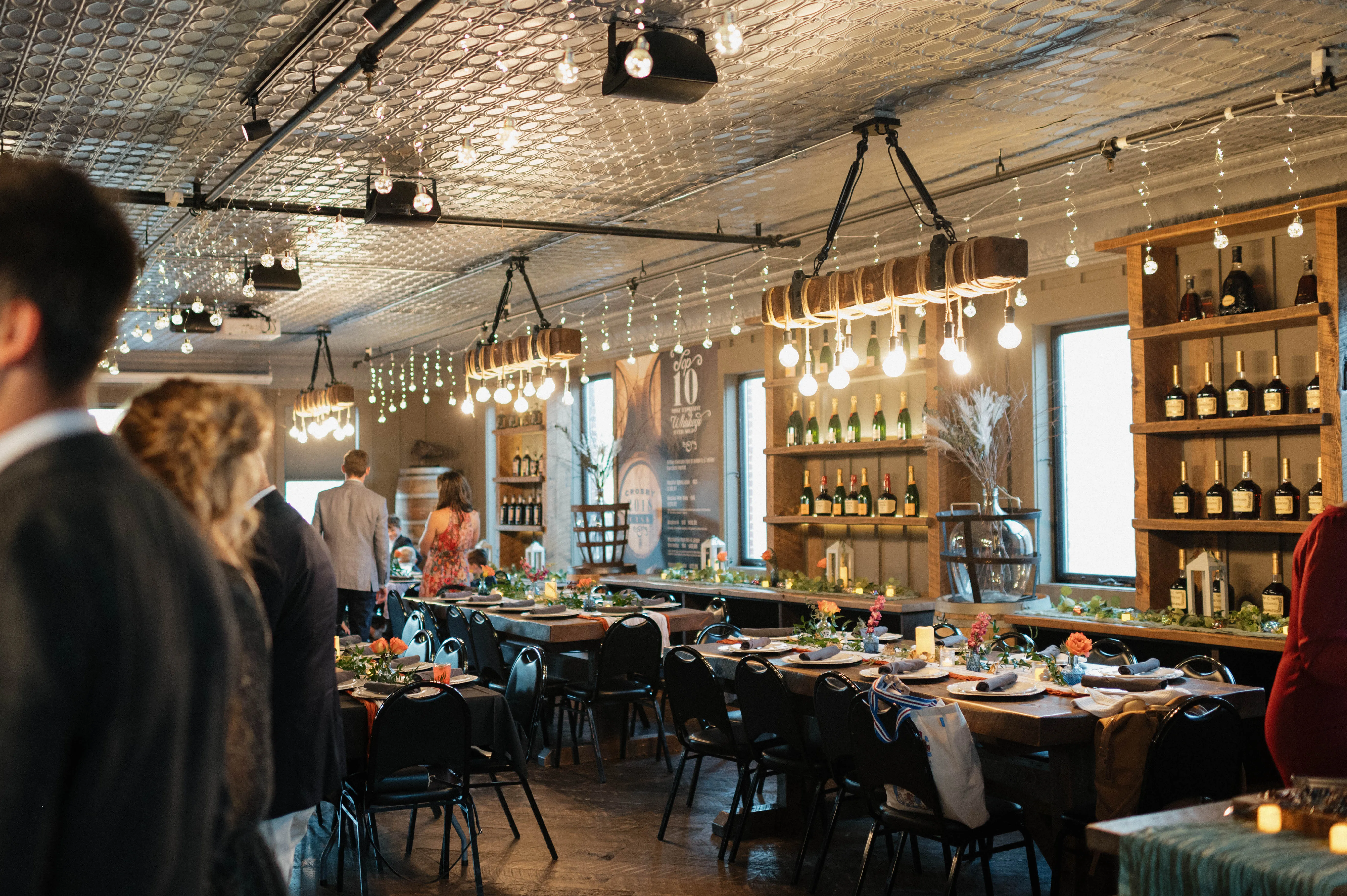 Wide view of the reception bar and dining room at The Stills